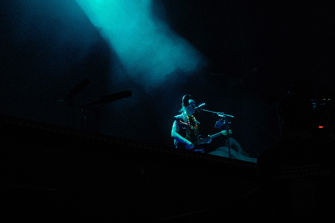 Performer under stage lights
