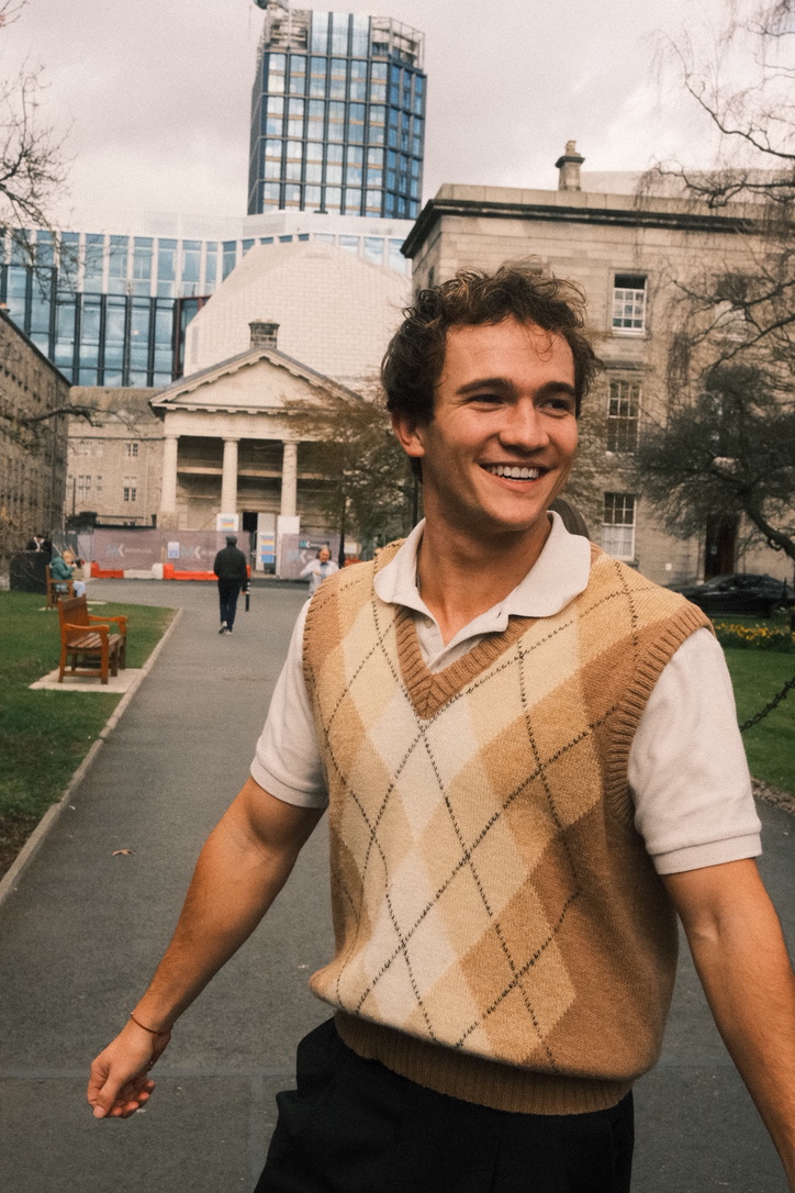 Portrait, smiling on a campus path