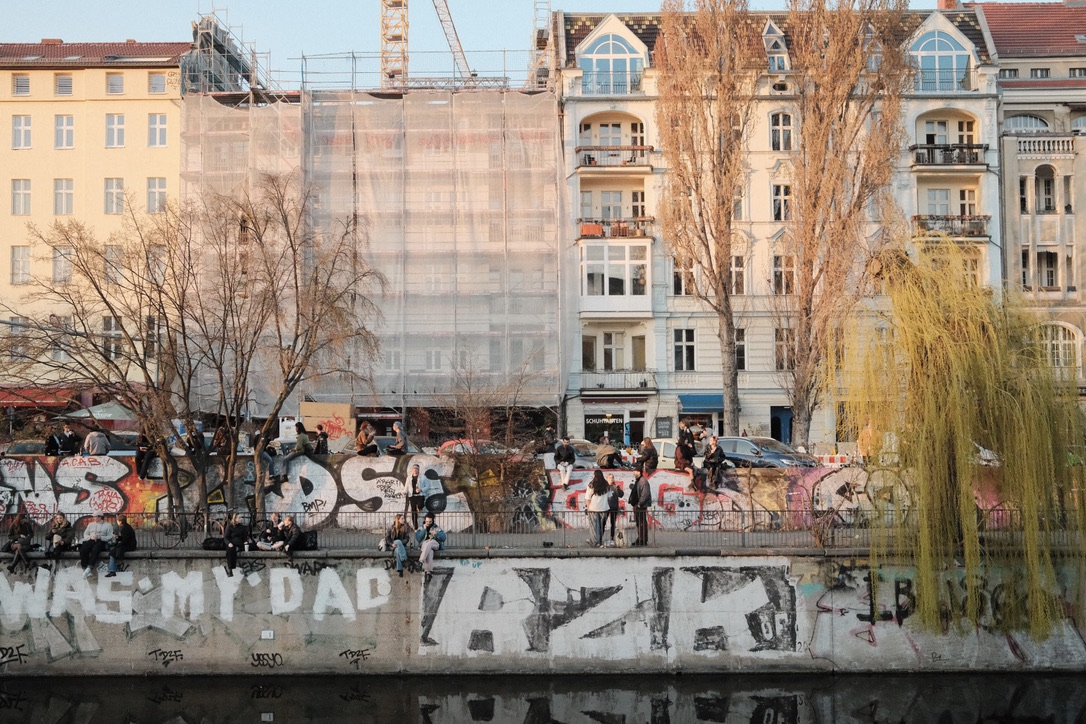Riverside street with graffiti