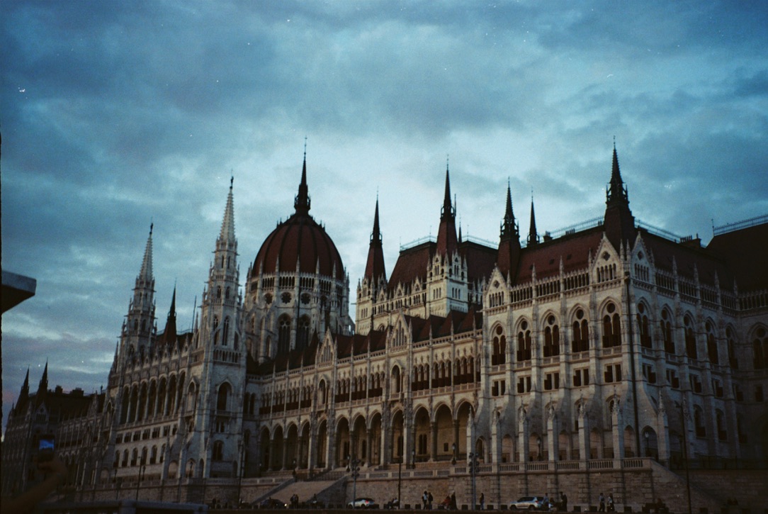 Grand parliament building at dusk